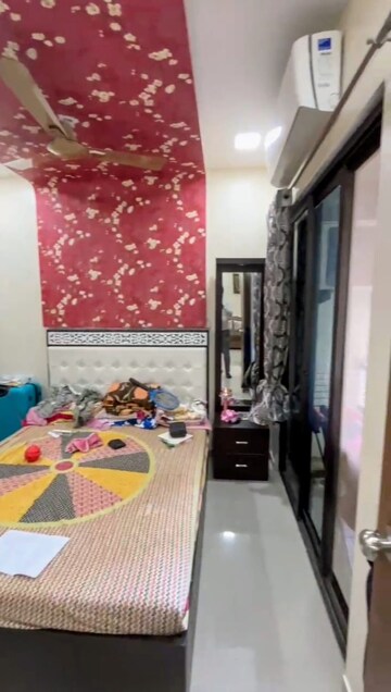 Master Bedroom in 1.5 BHK Apartment at Man Opus, Mira Road – for Sale