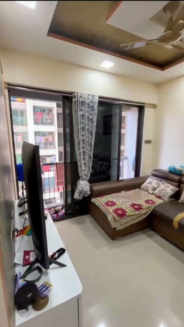 Living Room in 1.5 BHK Apartment at Man Opus, Mira Road – for Sale