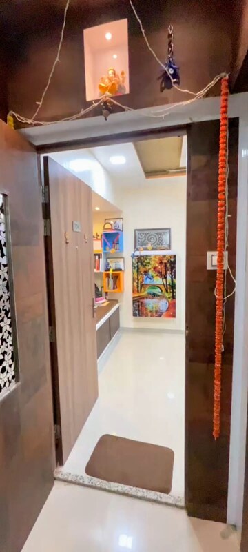 Living Room in 1.5 BHK Apartment at Man Opus, Mira Road – for Sale