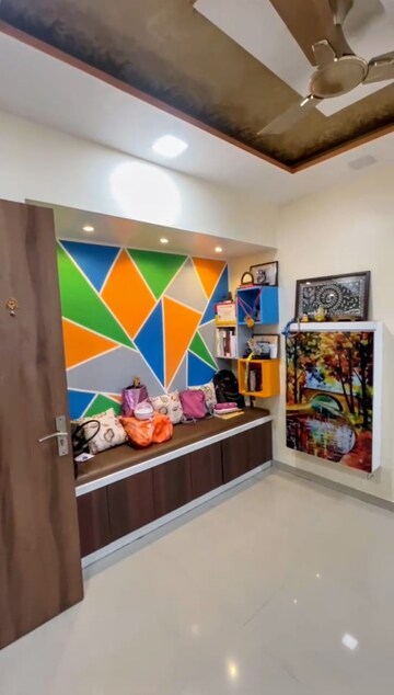 Living Room in 1.5 BHK Apartment at Man Opus, Mira Road – for Sale