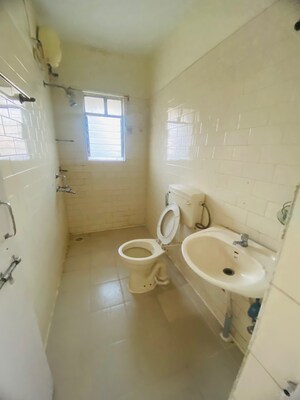 Bathroom in 2 BHK Apartment at Kolte Patil Green Acre, Salunkhe Vihar Society – for Rent