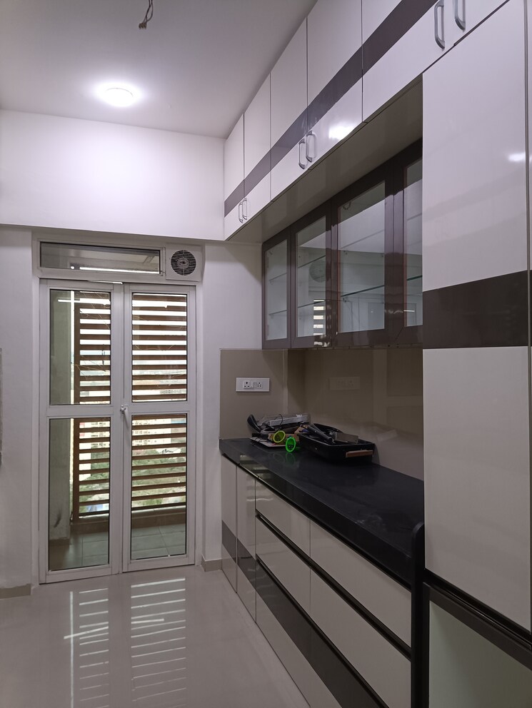 Kitchen, lodha-belmondo 2 Bedroom 1000 Sq.Ft. Apartment In Gahunje Pune 6552676