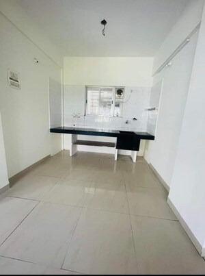 Kitchen in 2 BHK Apartment at Kumar Pushpak, Kondhwa – for Sale