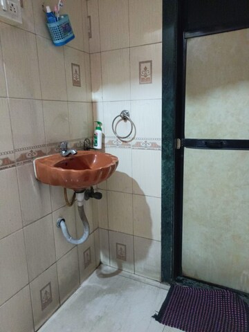 Bathroom in 2 BHK Apartment at Kharigaon – for Sale
