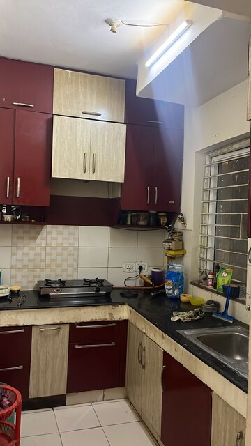 Kitchen in 2 BHK Apartment at Nimbus Express Park View, Chi V Greater Noida – for Rent