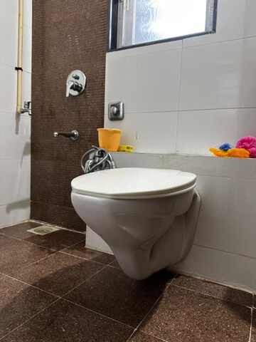 Bathroom in 1 BHK Apartment at Kharigaon – for Rent