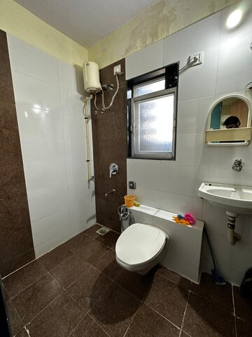 Bathroom in 1 BHK Apartment at Kharigaon – for Rent