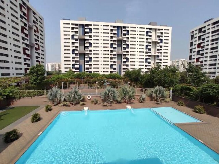 Swimming Pool, kumar-pebble-park 2 Bedroom 825 Sq.Ft. Apartment In Hadapsar Pune 6590788