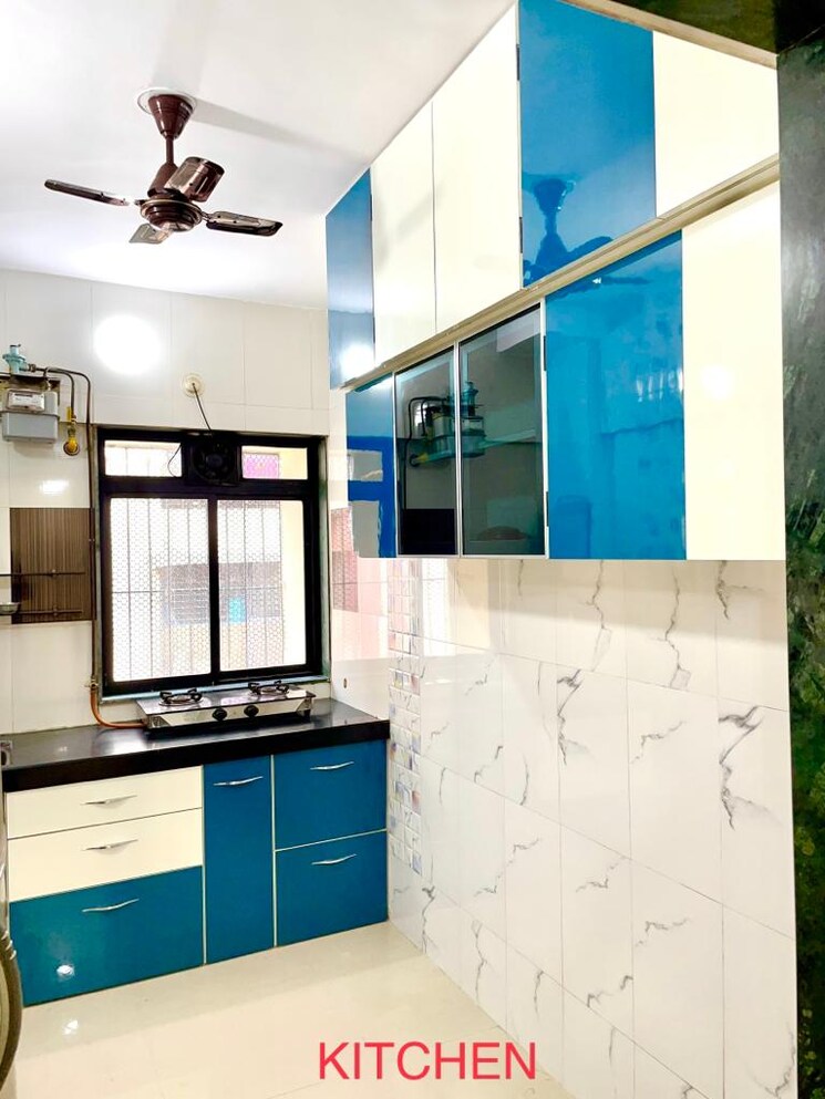Kitchen, blue-bird-chs 2 Bedroom 980 Sq.Ft. Apartment In Uthalsar Thane 6593061