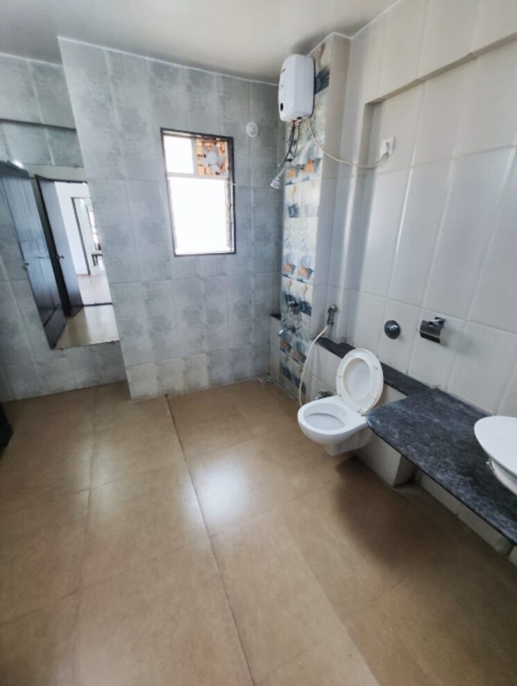 Bathroom, gera-park 2 Bedroom 900 Sq.Ft. Apartment In Sangamvadi Pune 6600697
