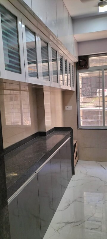 Kitchen in 2.5 BHK Apartment at Tattva Mittal Cove, Andheri West – for Rent