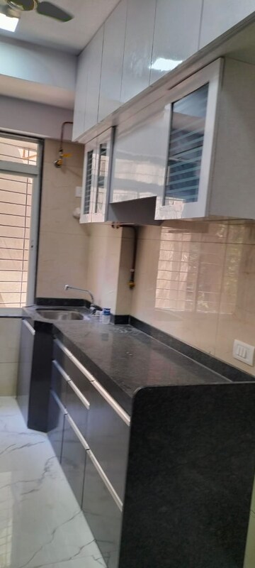Kitchen in 2.5 BHK Apartment at Tattva Mittal Cove, Andheri West – for Rent