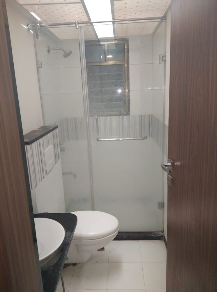 Bathroom, dreams-nandini 2 Bedroom 940 Sq.Ft. Apartment In Shewalwadi Pune 6613415