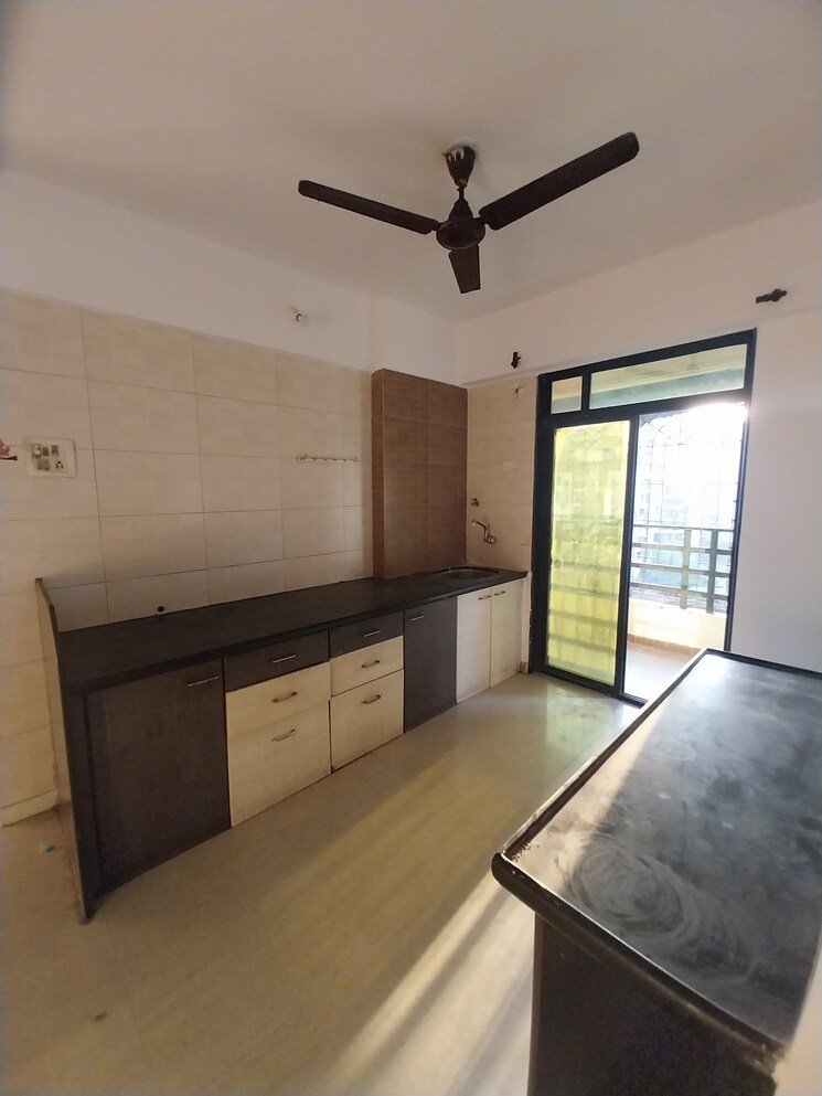 Kitchen, sterling-tower 2 Bedroom 1100 Sq.Ft. Apartment In Kamothe Navi Mumbai 6620133