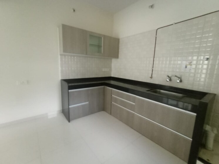 Kitchen, nyati-elan 3 Bedroom 945 Sq.Ft. Apartment In Wagholi Pune 6623545