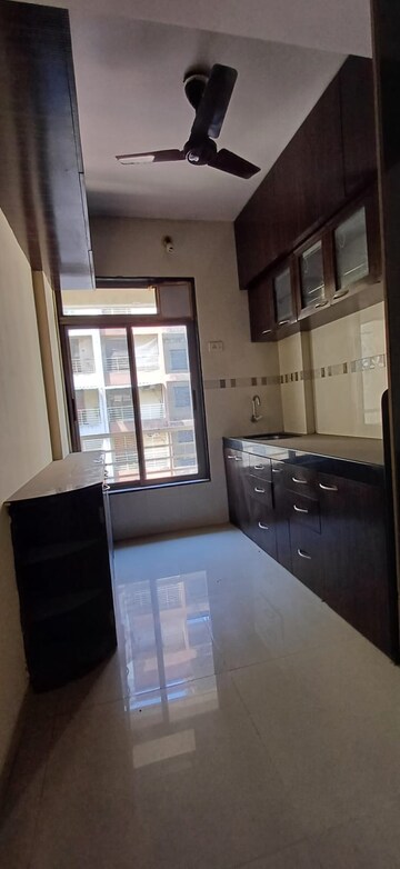 Kitchen in 1 BHK Apartment at Parsik Nagar – for Sale