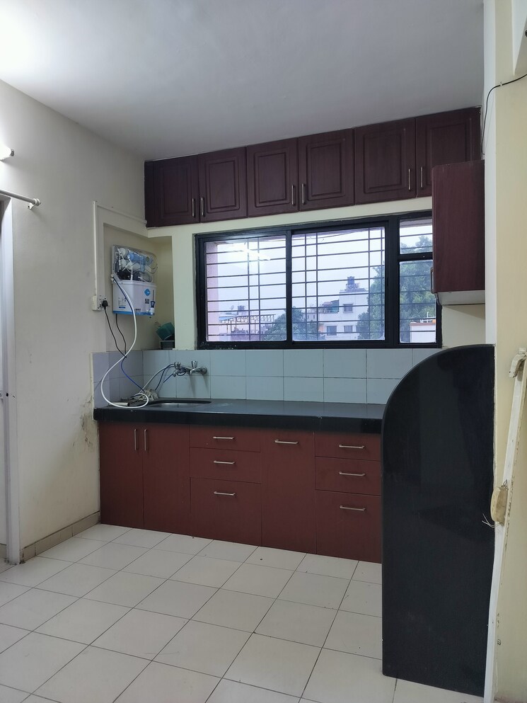 Kitchen, aishwarya-apartment-pune 3 Bedroom 1200 Sq.Ft. Apartment In Karve Nagar Pune 6639121