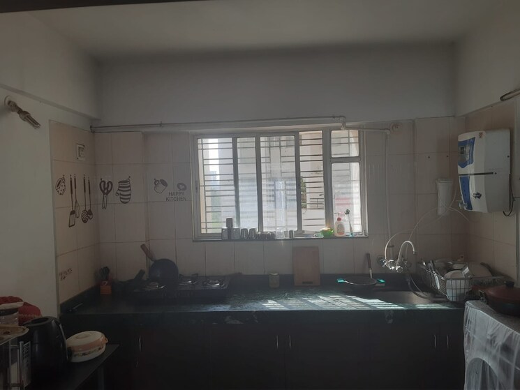 Kitchen, karan-rhea 2 Bedroom 800 Sq.Ft. Apartment In Wadegaon Pune 6654459