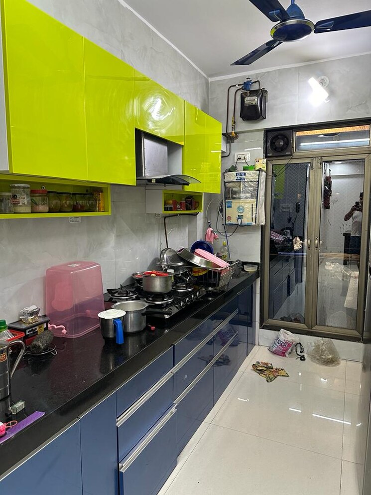 Kitchen, garden-court 3 Bedroom 867 Sq.Ft. Apartment In Waghbil Thane 6669129