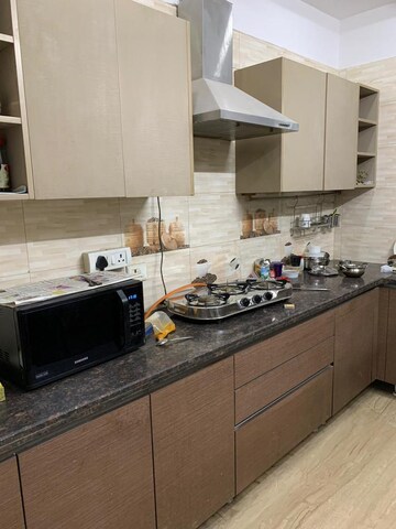 Kitchen in 3.5 BHK Apartment at Emaar The Enclave, Sector 66 – for Sale