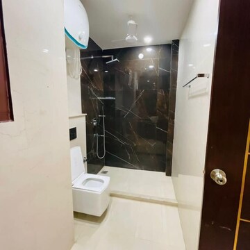 Bathroom in 4 BHK Builder Floor at Ansal API Esencia Wood Winds, Sector 67 – for Rent