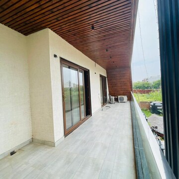 Balcony in 4 BHK Builder Floor at Ansal API Esencia Wood Winds, Sector 67 – for Rent