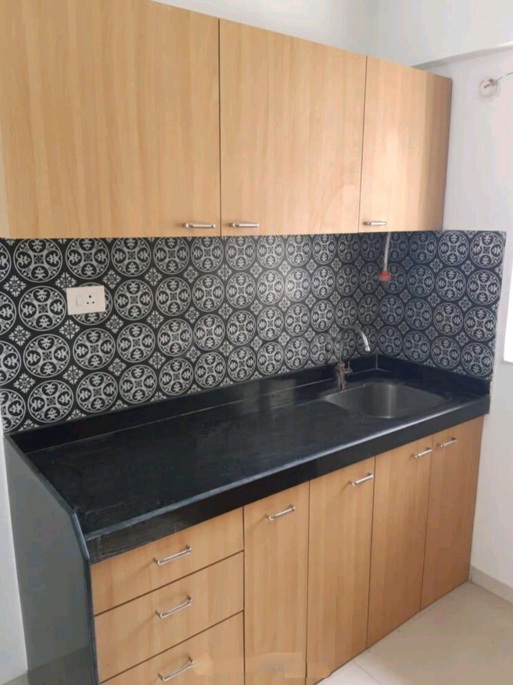 Kitchen, lodha-amara 3 Bedroom 955 Sq.Ft. Apartment In Kolshet Road Thane 6737619