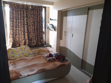 Bedroom in 3 BHK Apartment at Kandivali West – for Sale