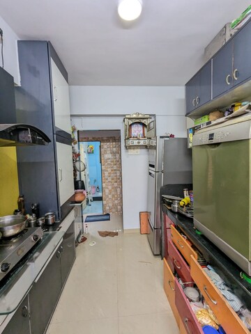 Kitchen in 1 BHK Apartment at Parsik Nagar – for Sale