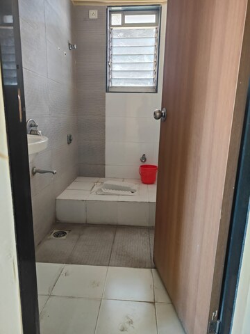 Bathroom in 1 BHK Apartment at Kharigaon – for Sale