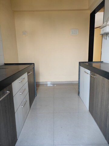 Kitchen in 1 BHK Apartment at Kharigaon – for Sale