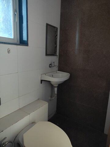 Bathroom in 1 BHK Apartment at Kharigaon – for Sale