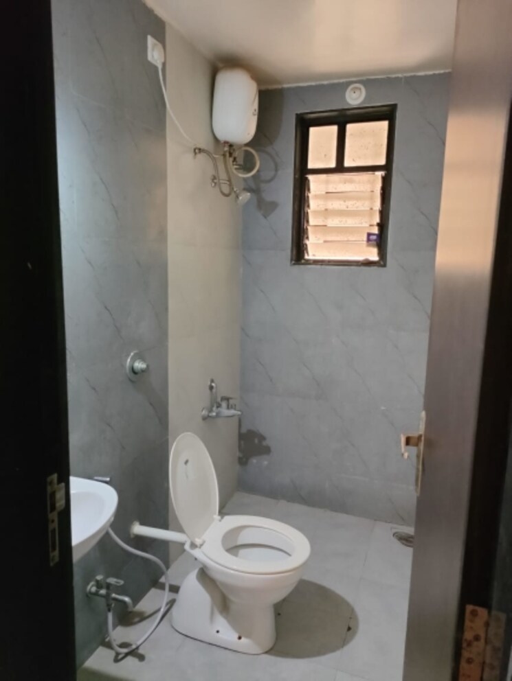 Bathroom, dreams-nandini 2 Bedroom 1080 Sq.Ft. Apartment In Shewalwadi Pune 6763442