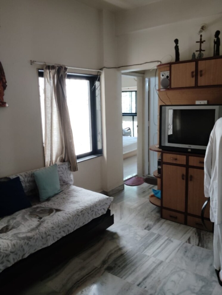 Living Room, gera-park 1 Bedroom 500 Sq.Ft. Apartment In Sangamvadi Pune 6775297