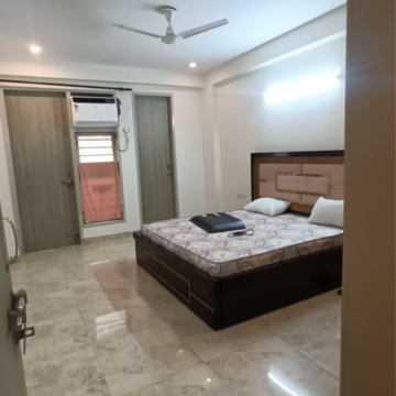 Bedroom in 3 BHK Builder Floor at Ansal Sushant Lok I, Sector 43 – for Rent