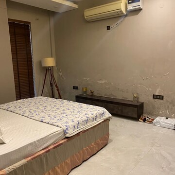 Bedroom in 3 BHK Builder Floor at Ansal Sushant Lok I, Sector 43 – for Rent