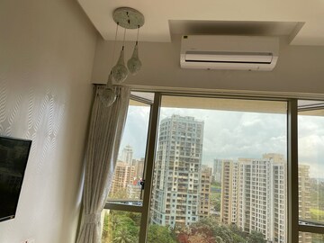 Bedroom in 2 BHK Apartment at Transcon Triumph Tower, Andheri West – for Rent