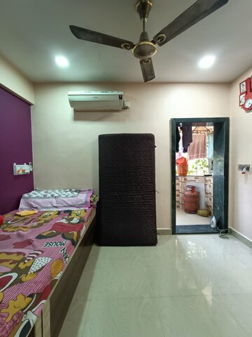 Bedroom in 1 BHK Apartment at Kharigaon – for Sale