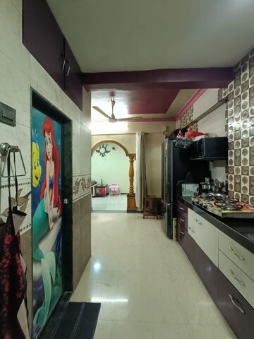 Kitchen in 1 BHK Apartment at Kharigaon – for Sale