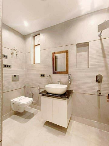Bathroom in 4 BHK Builder Floor at Green Fields Colony – for Sale