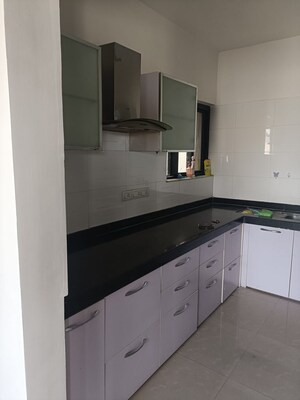 Kitchen in 2 BHK Apartment at Dorabjee Paradise Building A&B Condominium, Mohammadwadi – for Sale