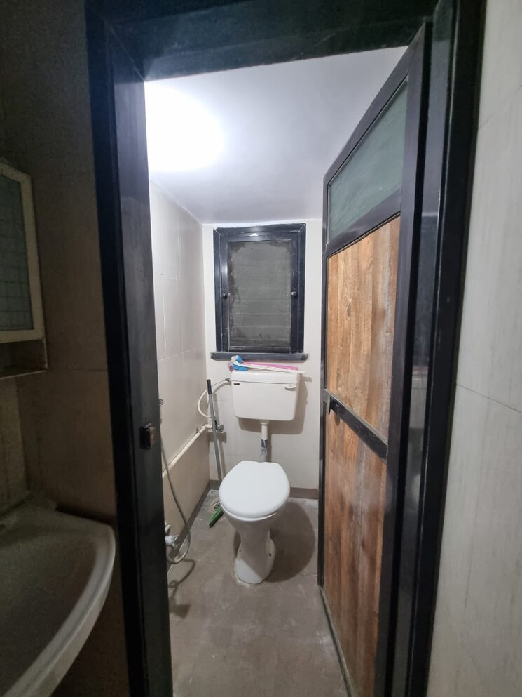 Bathroom, om-sai-residency-dombivali 2 Bedroom 947 Sq.Ft. Apartment In Dombivli East Thane 6817371