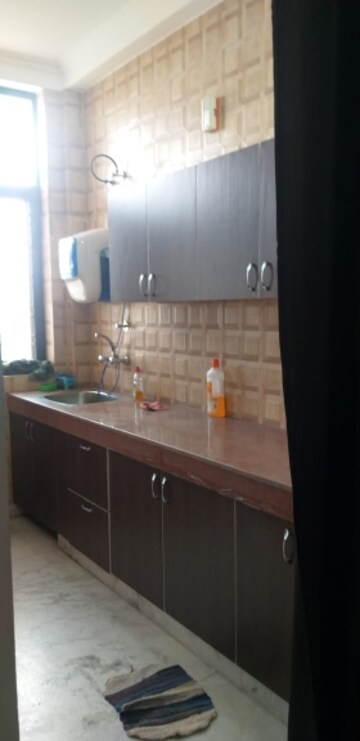 Kitchen in 1.5 BHK Builder Floor at Ansal Plaza Sector-23, Sector 23 – for Rent