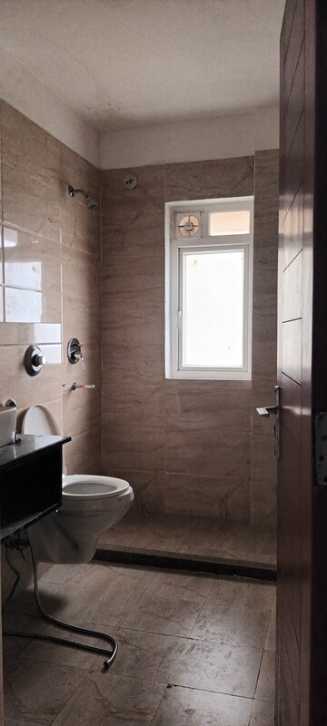 Bathroom in 3 BHK Apartment at Ramprastha Platinum Premier, Vaishali Sector 3 – for Sale