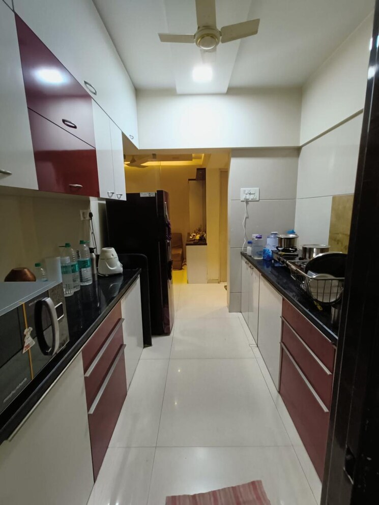 Kitchen, unique-greens-ghodbunder-road 2 Bedroom 620 Sq.Ft. Apartment In Ghodbunder Road Thane 6873675
