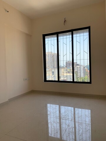 Room in 2 BHK Apartment at Prerana CHS, Borivali West – for Sale