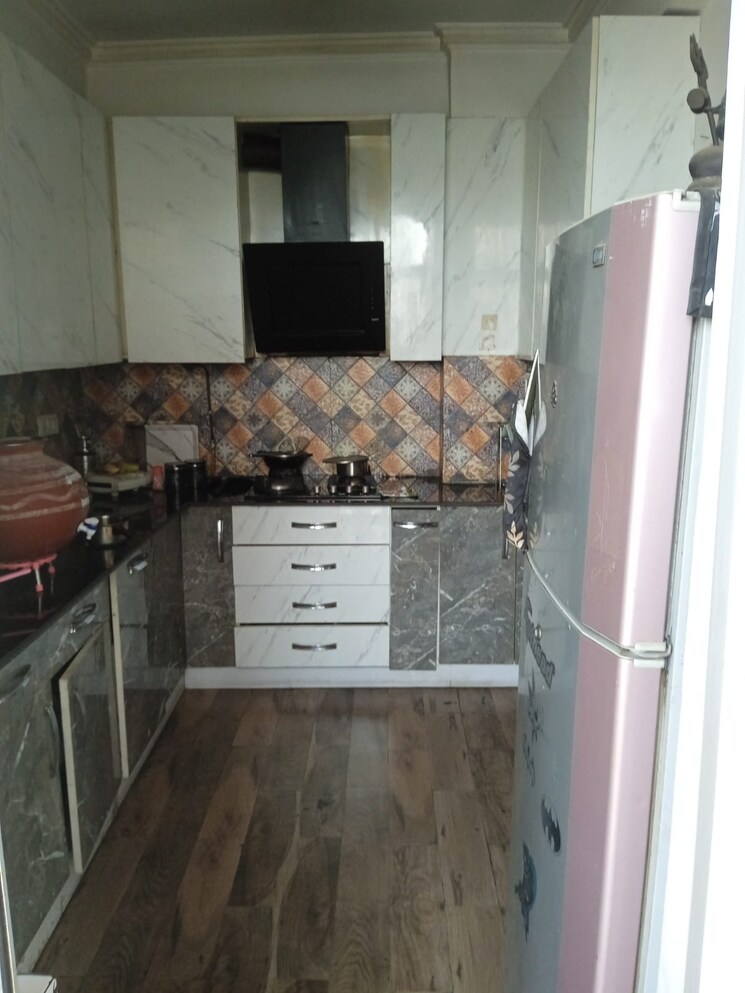 Kitchen, tulip-purple 4 Bedroom 2400 Sq.Ft. Apartment In Sector 69 Gurgaon 6889372