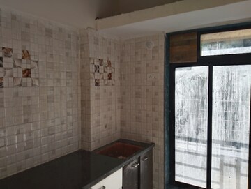 Kitchen in 1.5 BHK Apartment at Dew Berry, Nalasopara West – for Sale
