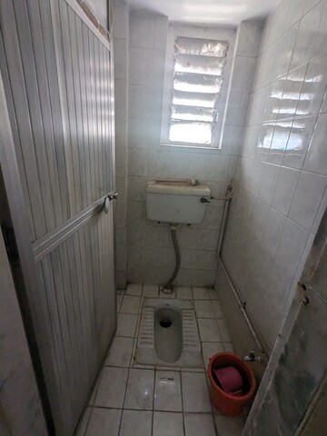 Bathroom in 1 BHK Apartment at Madhumalati CHS, Kalwa – for Rent