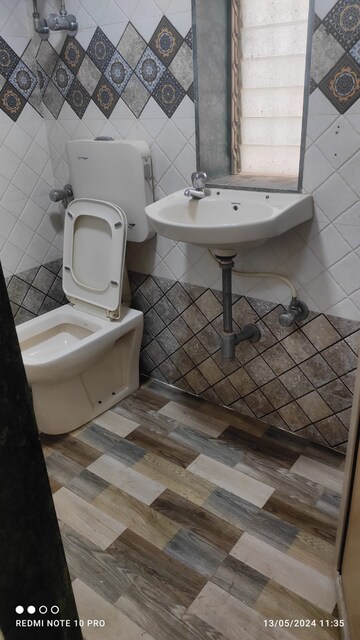 Bathroom in 2 BHK Apartment at Yashodhara CHS, Goregaon East – for Rent